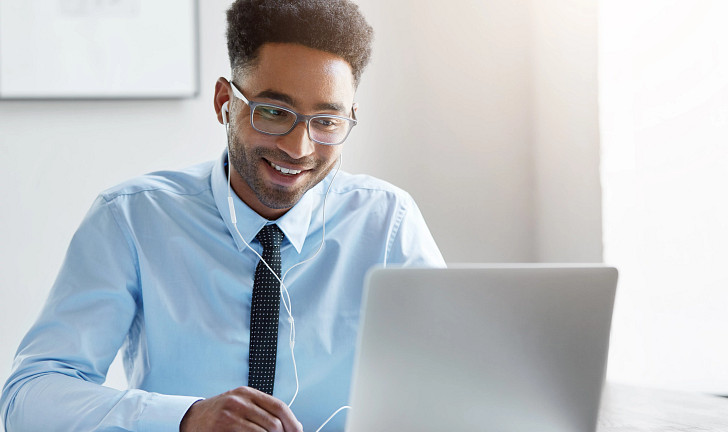 Happy businessman working
