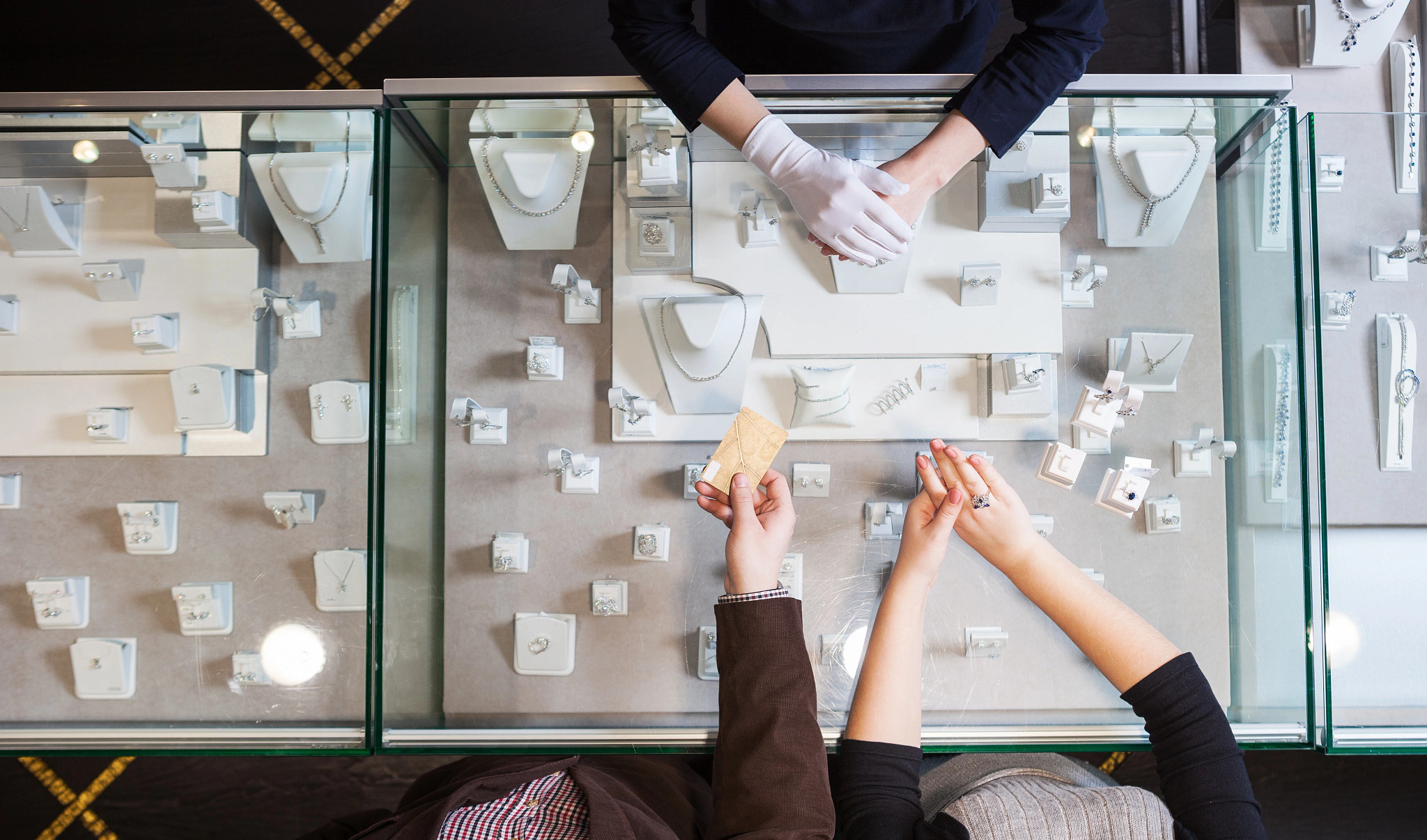 Overhead view of jewelry purchase