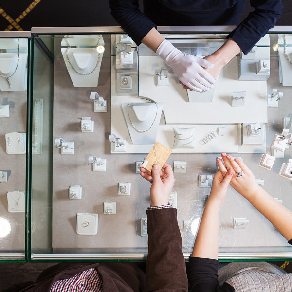 Overhead view of jewelry purchase