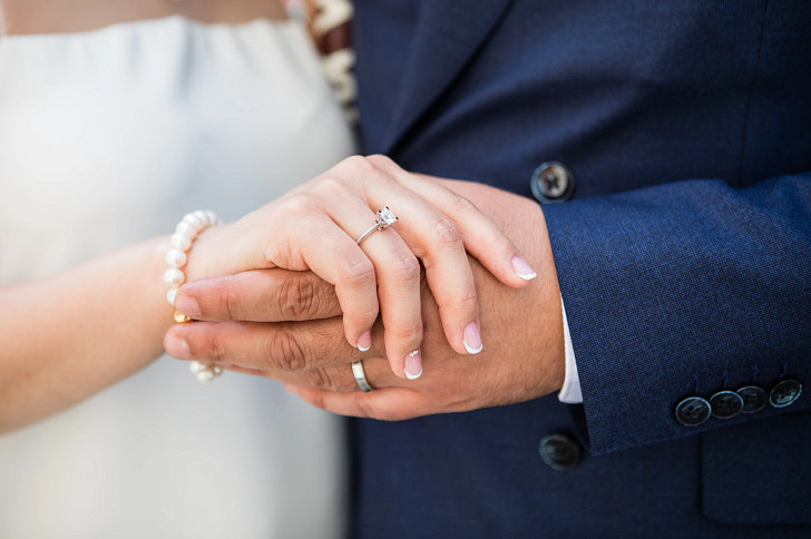 Bride showcasing her ring