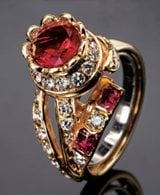 Red beryl ring with diamonds