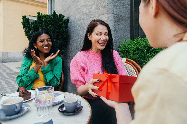 Friends giving gifts